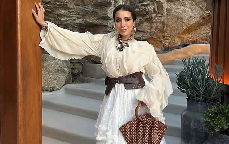 ثماني أفكار لارتداء لون Cloud Dancer هذا الربيع